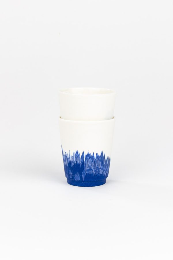 Close-up of blue glaze on MOCA handmade ceramic espresso cup set - dripping technique