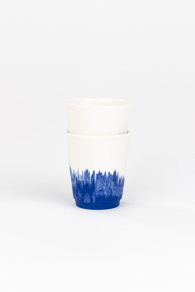 Close-up of blue glaze on MOCA handmade ceramic espresso cup set - dripping technique