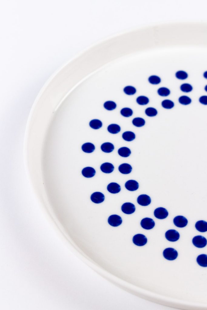 Side of a MOCA handmade ceramic dinner plate 24cm – food-safe blue glaze, artisan porcelain