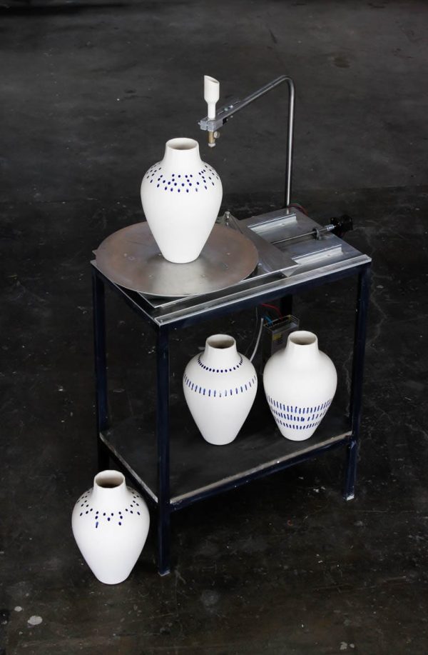 MOCA dripping machine creating unique white porcelain vase – Eindhoven & Nantes studio