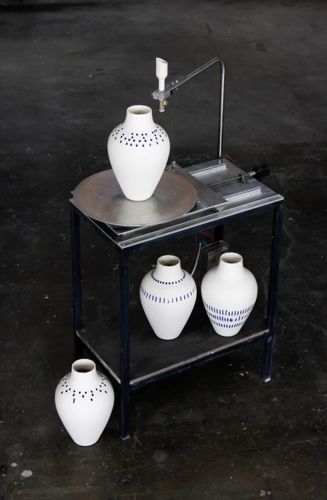 MOCA dripping machine creating unique white porcelain vase – Eindhoven & Nantes studio