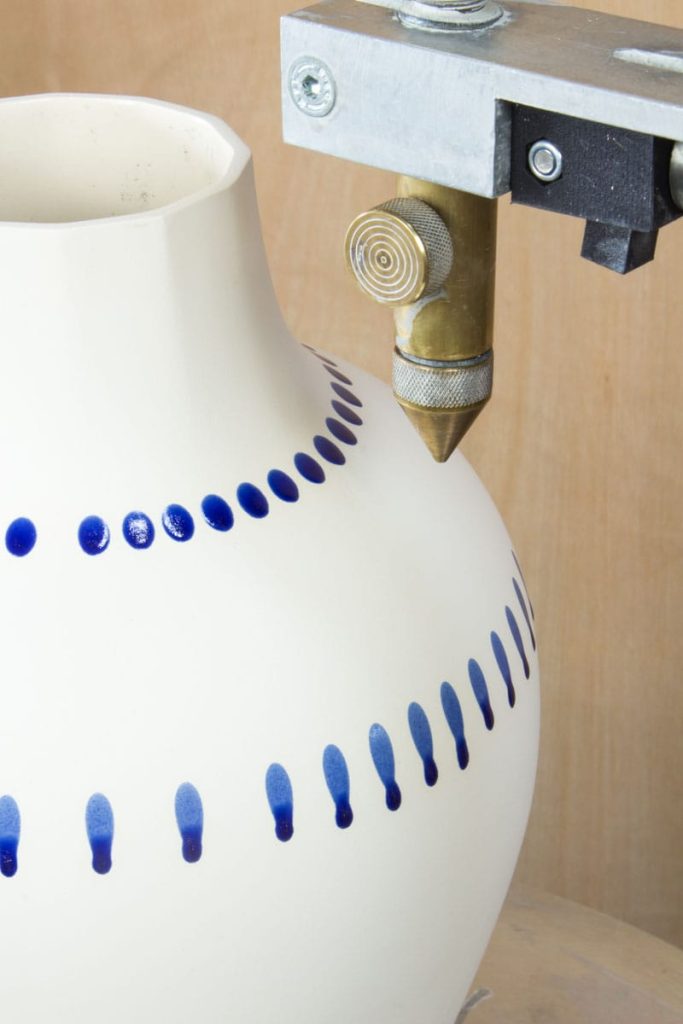 Close-up blue glaze dripping on MOCA white porcelain vase – artisan technique Eindhoven & Nantes